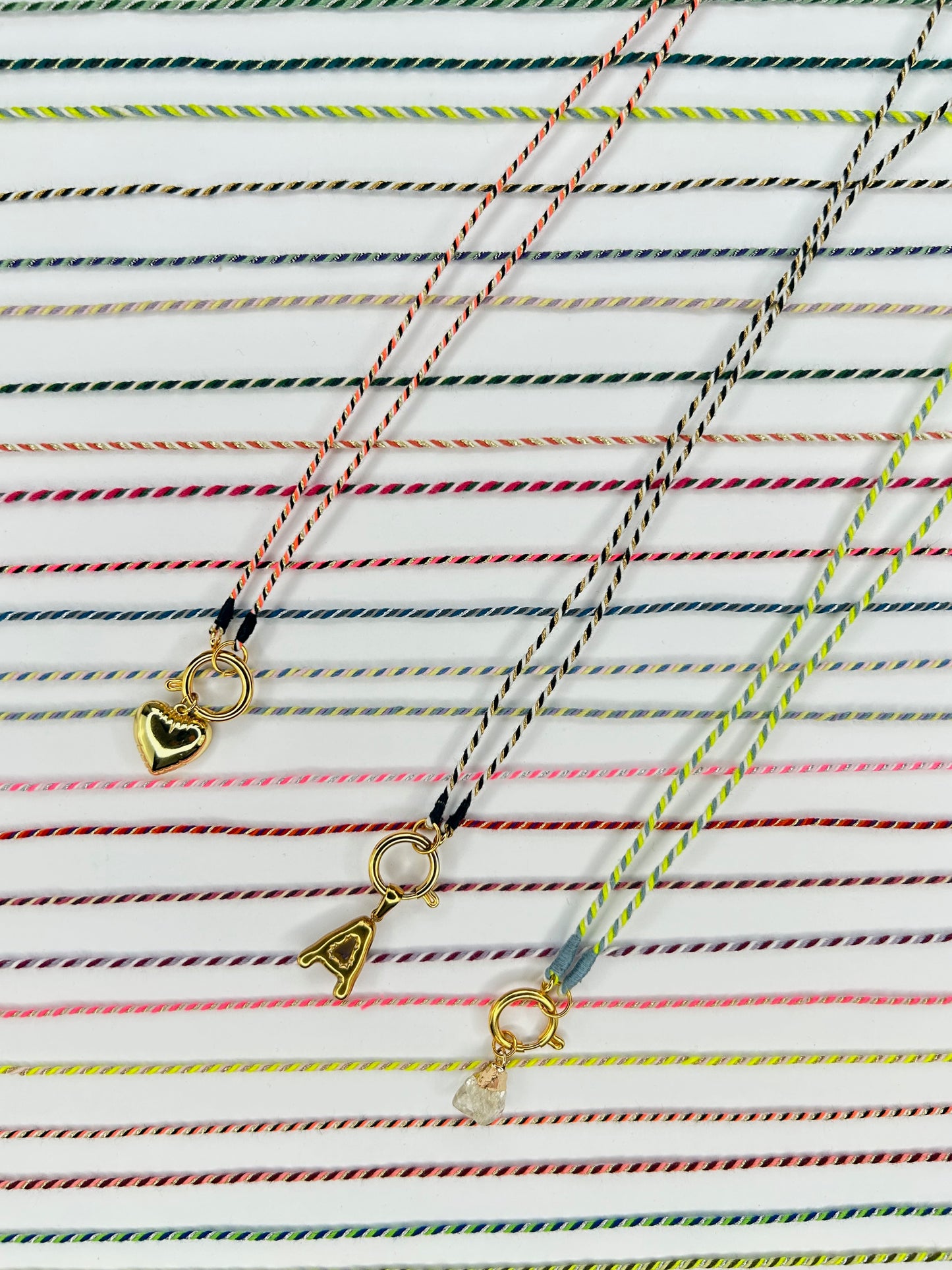 Kette Turnon (schwarz weiß orange gold)