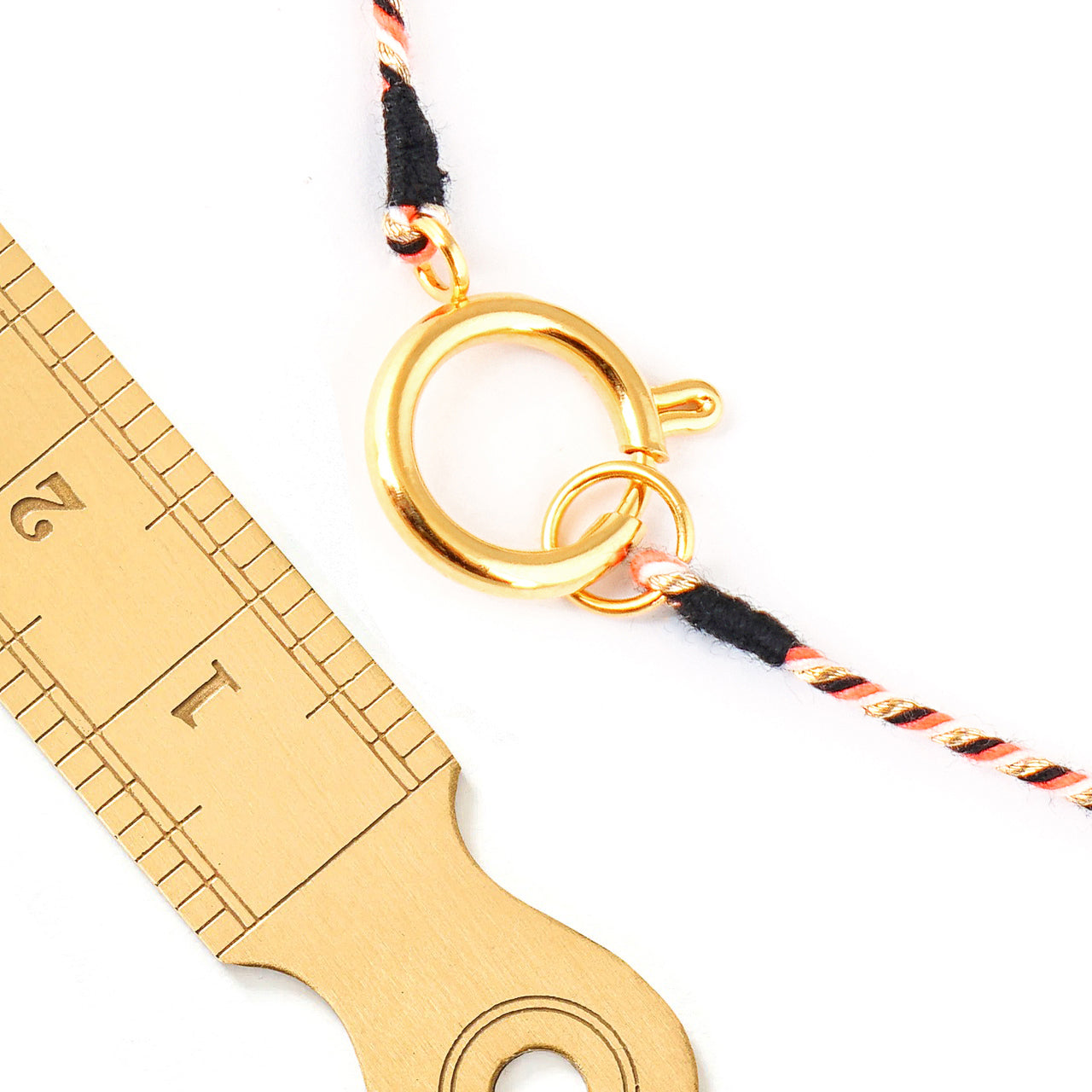 Kette Turnon (schwarz weiß orange gold)