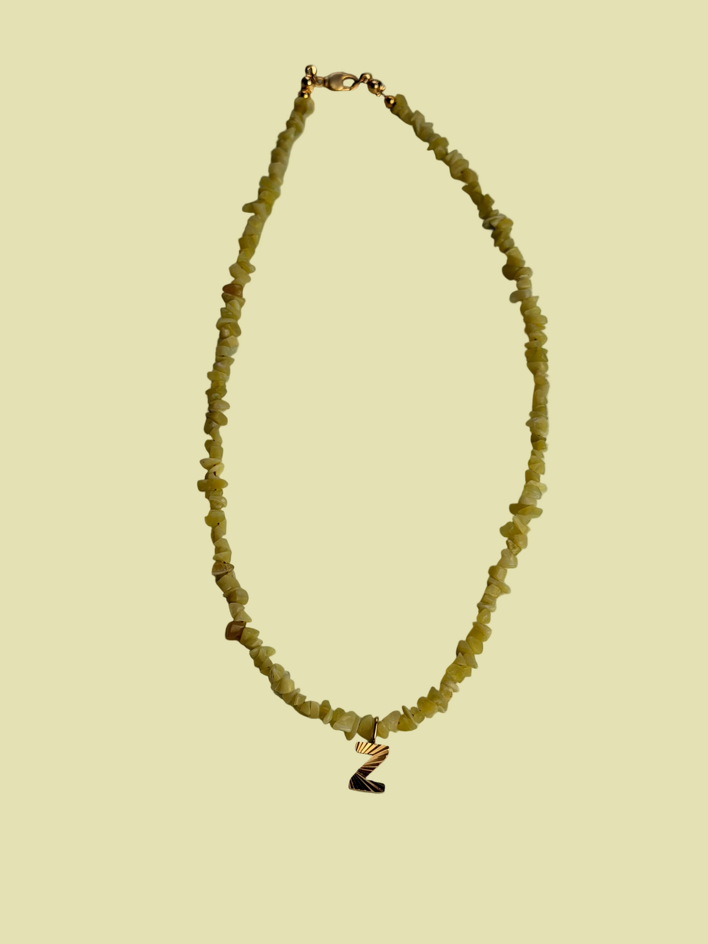 Kette Initial Gem yellow